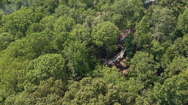 There's Trinity Treehouse; nestled among trees in Arabia Mountain's Nature Preserve!
Major storms can bring down power lines. A standby generator at Trinity Treehouse ensures power will not be interrupted.
Credit: Dickersonarts.com