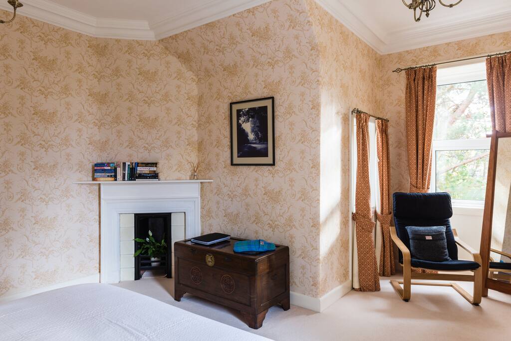 with windows on 3 sides, it is a lovely bright room