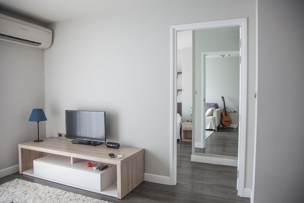 Tv space and door way to the bedroom