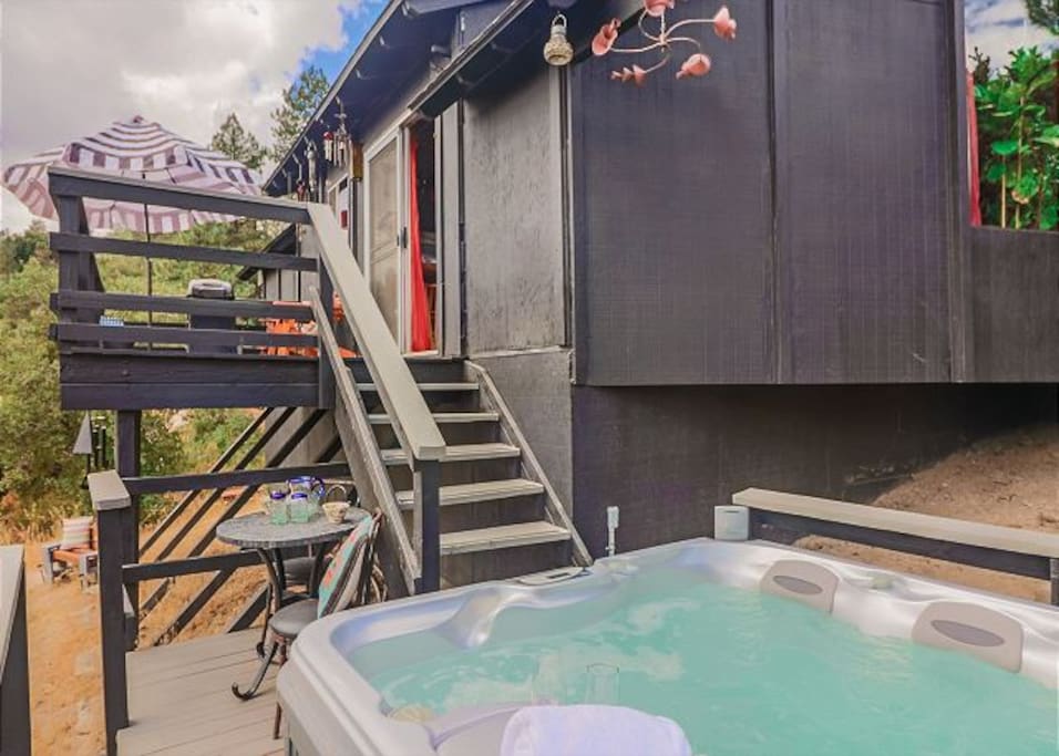 Back deck has spa and BBQ.