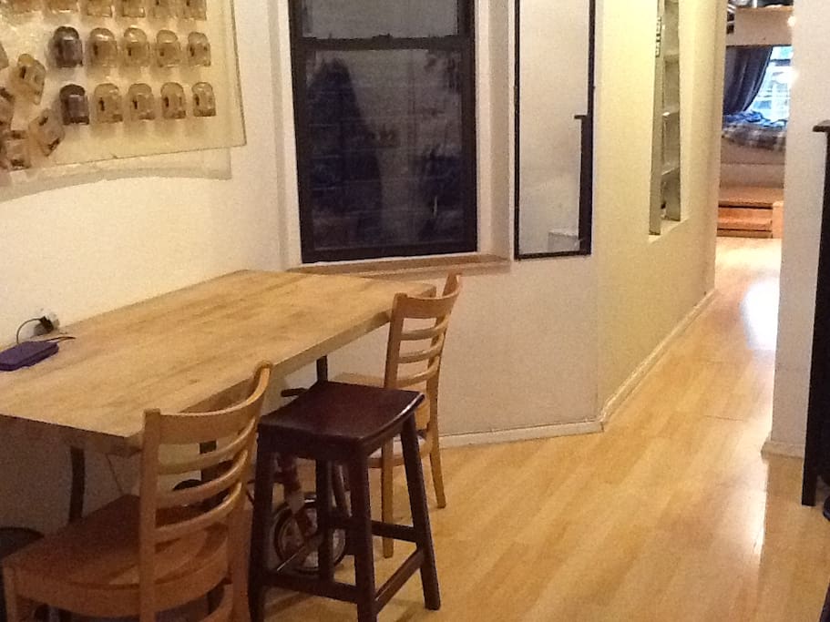 small room with a table and chairs