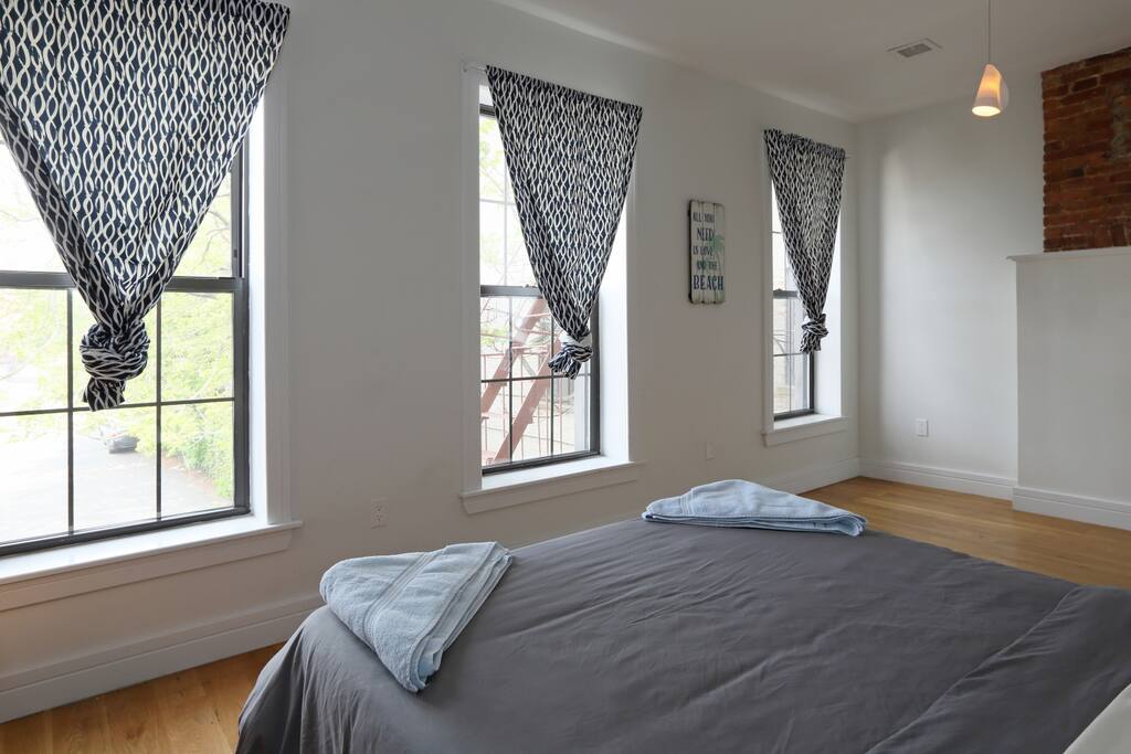 Large bedroom with queen-size bed