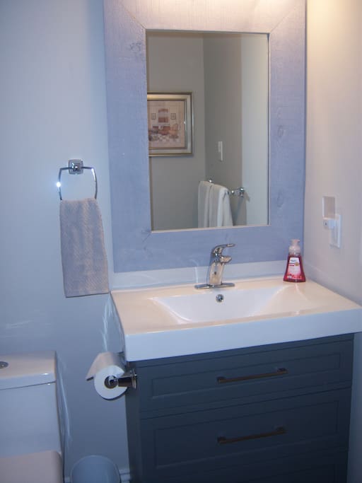 Ensuite Bathroom from Bedroom 1 with Tub and Shower