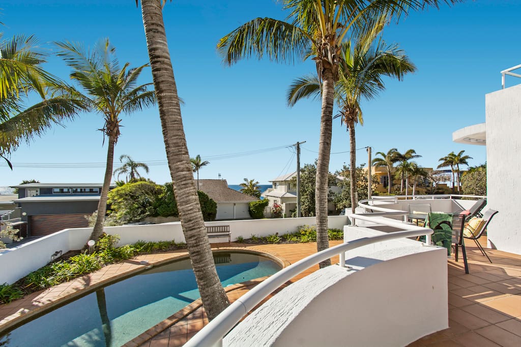 Balcony with a view of pool