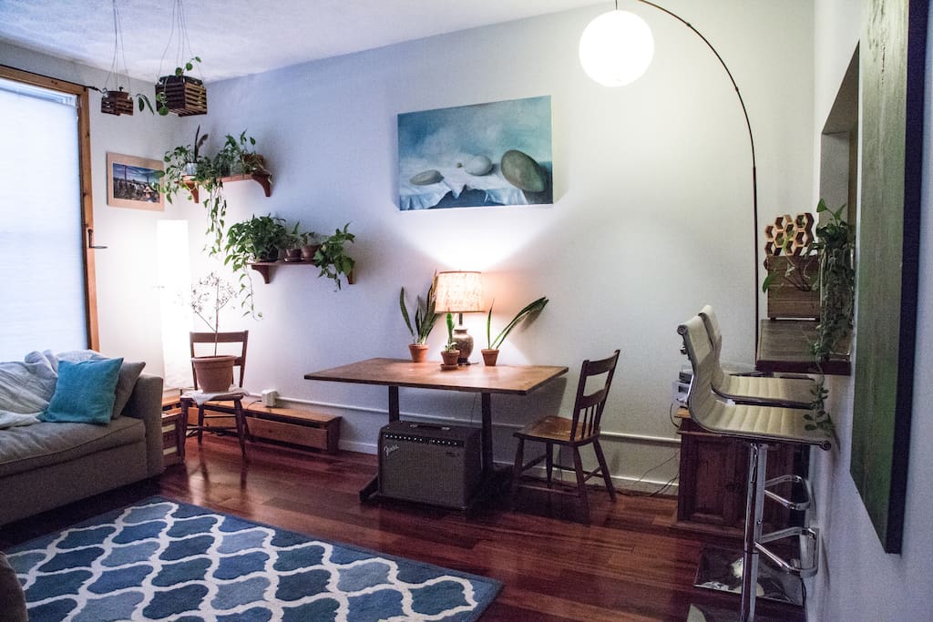 Sunny living room with comfy couches.