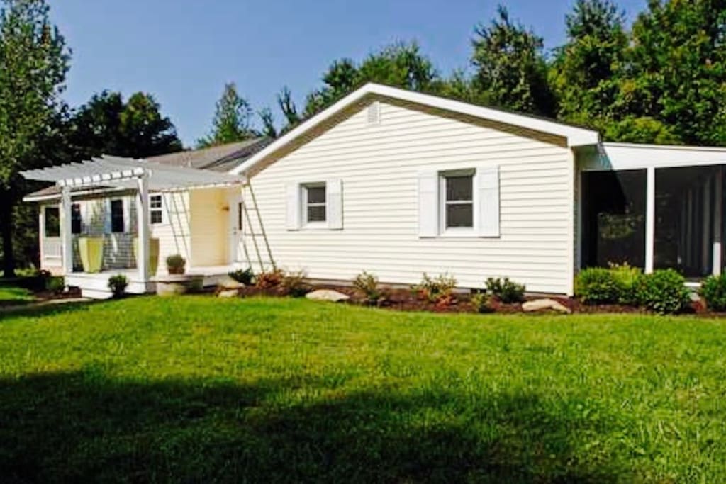 Front of house, screened porch to right off living room.