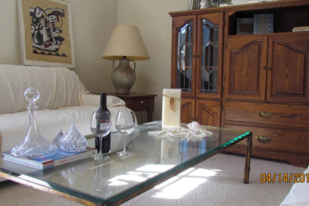 The indoor seating space; there's a TV in the cabinet.