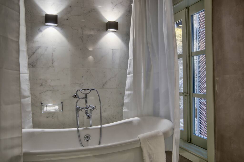 Bathroom with freestanding bath