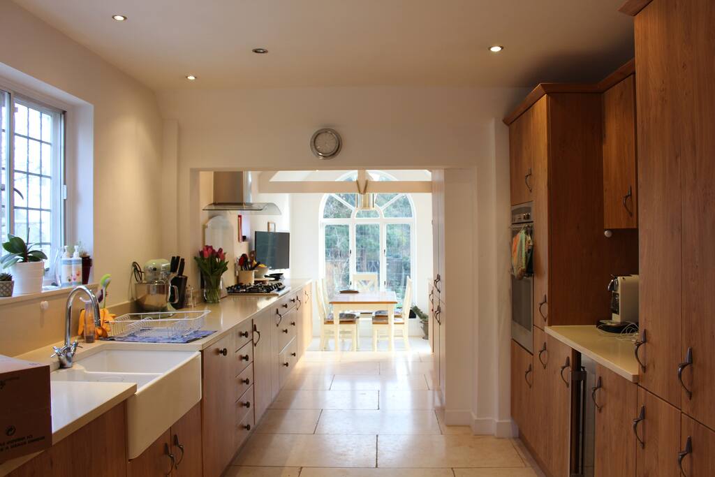 Kitchen with seating area overlooking garden and terrace