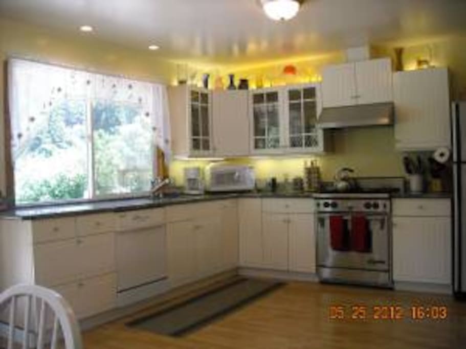 We love the kitchen, faces backyard and Russian River