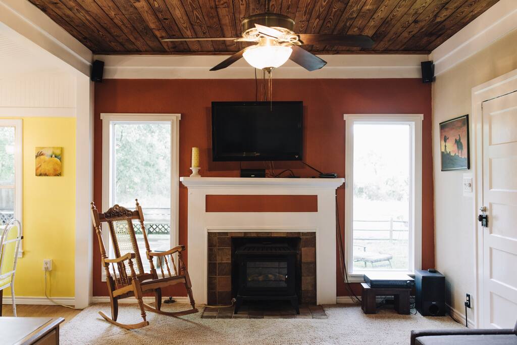Living room with a TV and DVD surround sound system.