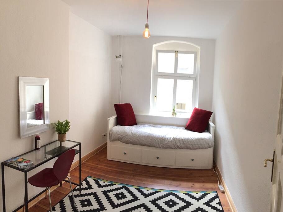 Queen Bed Converts to Day Bed for Single Guests