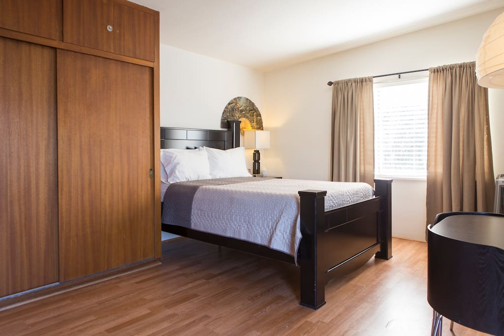 Queen size bed with memory foam mattress, full dresser, table and chairs for four and space for queen air mattress