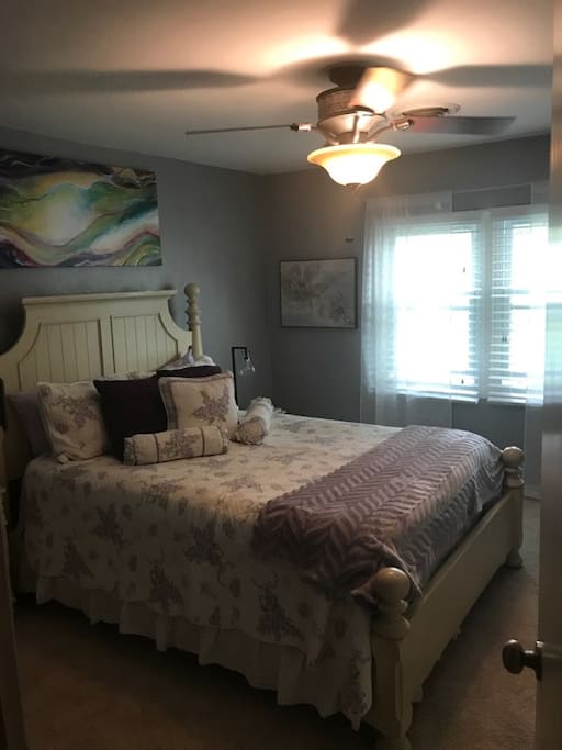 Bedroom 1: Queen bed, desk, closet, two bedside stands