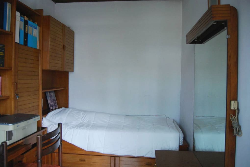 First bedroom with single bed and optional extra bed