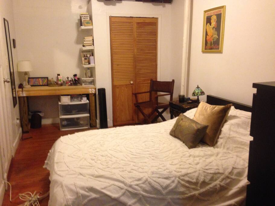 Cozy, well decorated bedroom with Full size bed