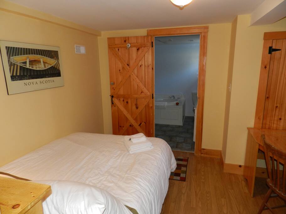 The view of the room as you enter. The bathroom is through the bedroom and is fully private.