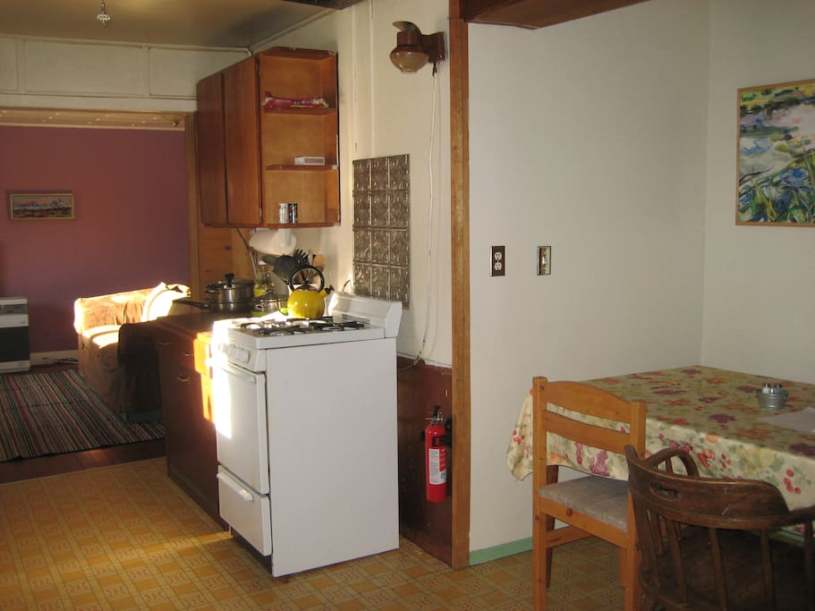 The suite has a full kitchen, large table and room to spread out and hang out.
