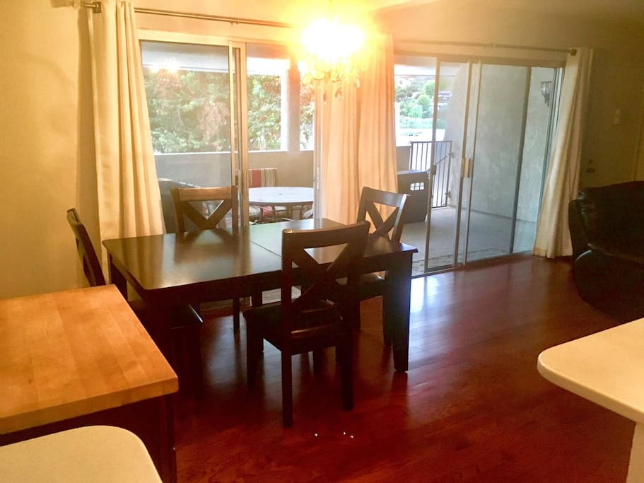 Overview - Open Floor-plan Living Room/Dining Room/Kitchen Area & Balcony Area with Lake Views