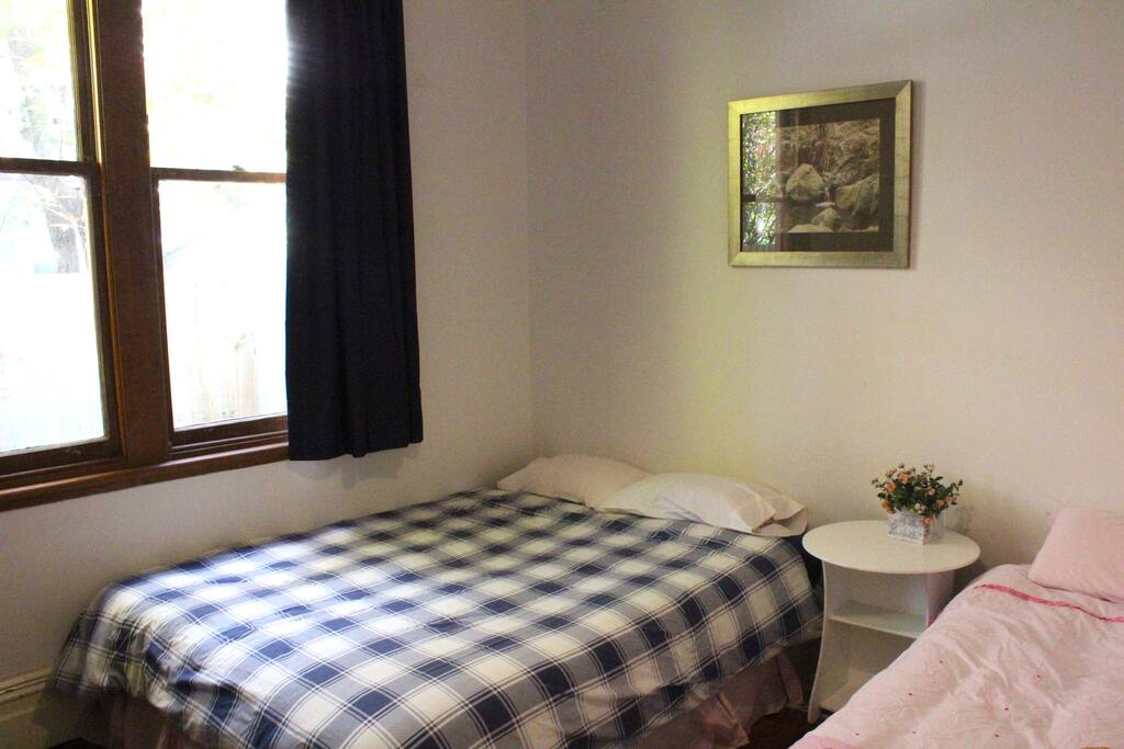 Your bedroom has one queen and one single bed perfect for friends traveling together or families with children. We also have an extra fold out bed available if you have two children.
