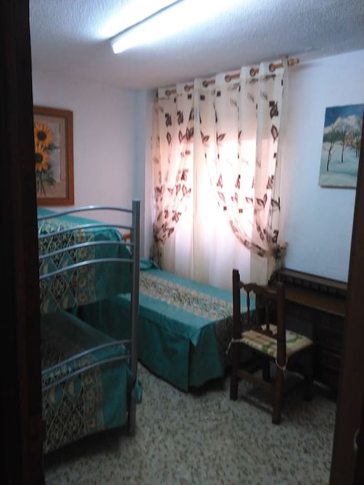 Dormitorio 3 camas