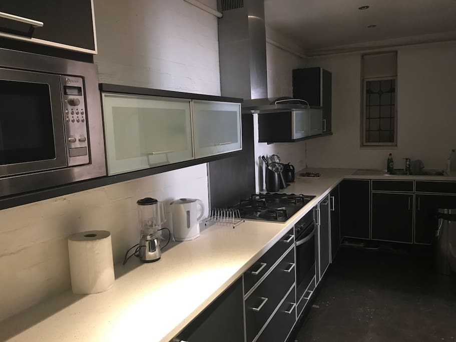 Fully featured kitchen including microwave, washer-dryer, fridge, freezer, kettle, juicer and dishwasher. Includes cutlery, crockery, pots and pans.