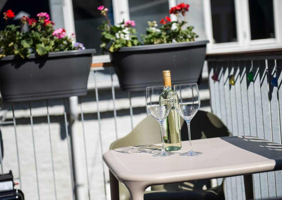 Enjoy the summer on the balcony where you use a Weber gas grill unlimted.