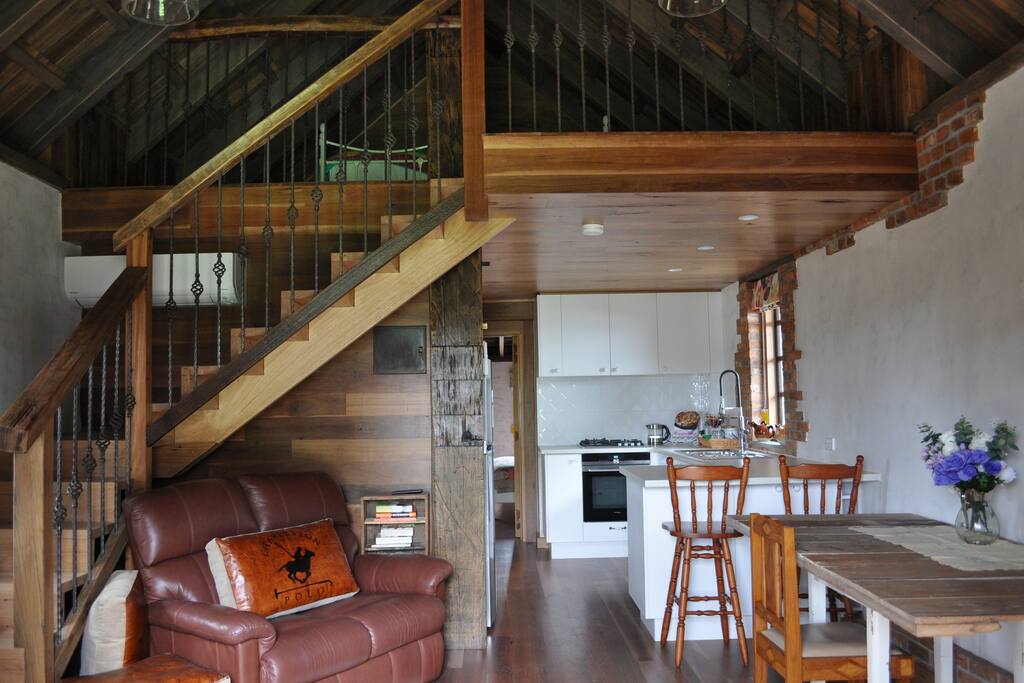 View of staircase and kitchen