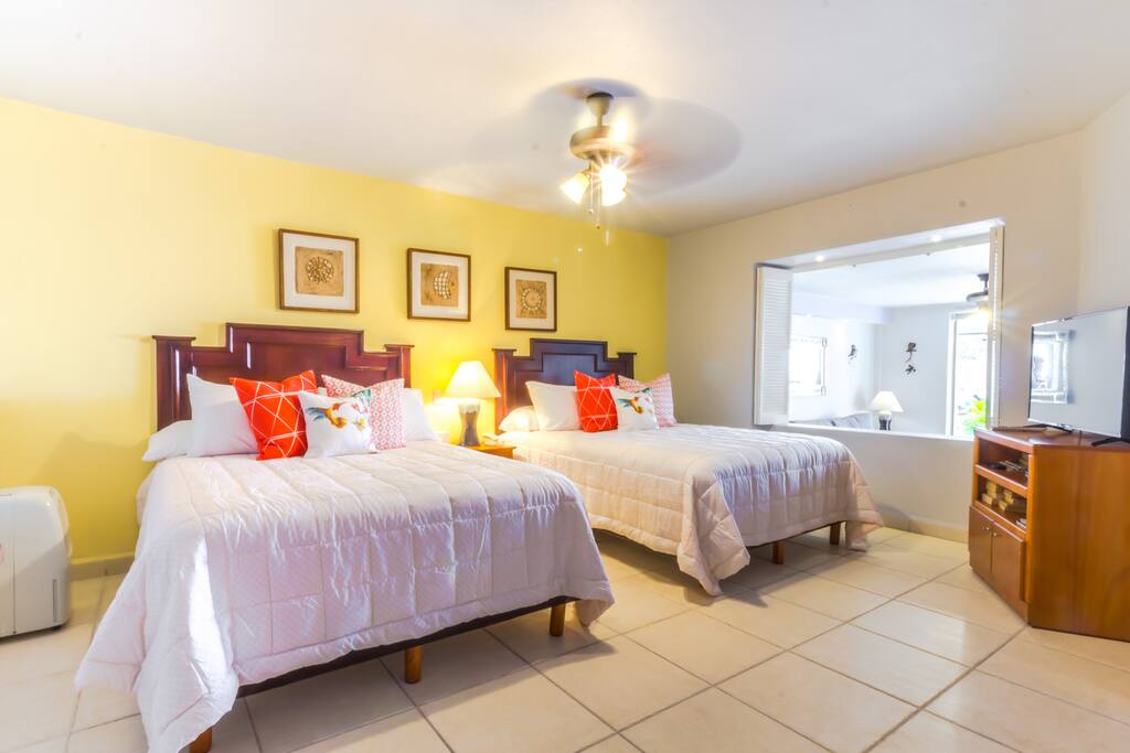 Ample bedroom with 40" flat screen TV
