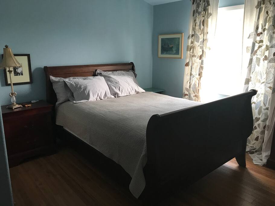 Comfy queen bed, empty dresser drawers, closet space, shelf space, suitcase rack