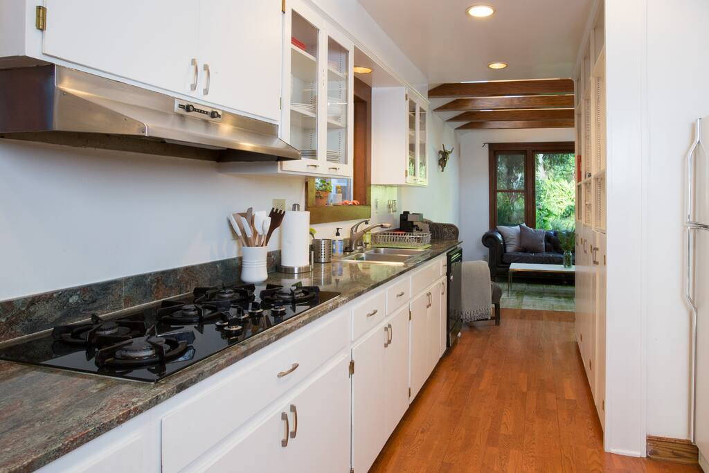 Equiped and well lit large kitchen
