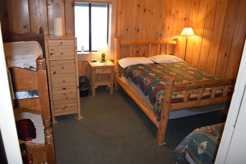Lodge Room with Queen bed, twin bed and bunk beds (bring sleeping bags)., Bathrooms down the hallway -separate for men and women.