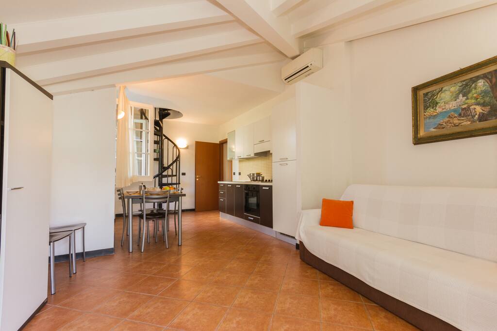 Living room with flat screen TV and sofa