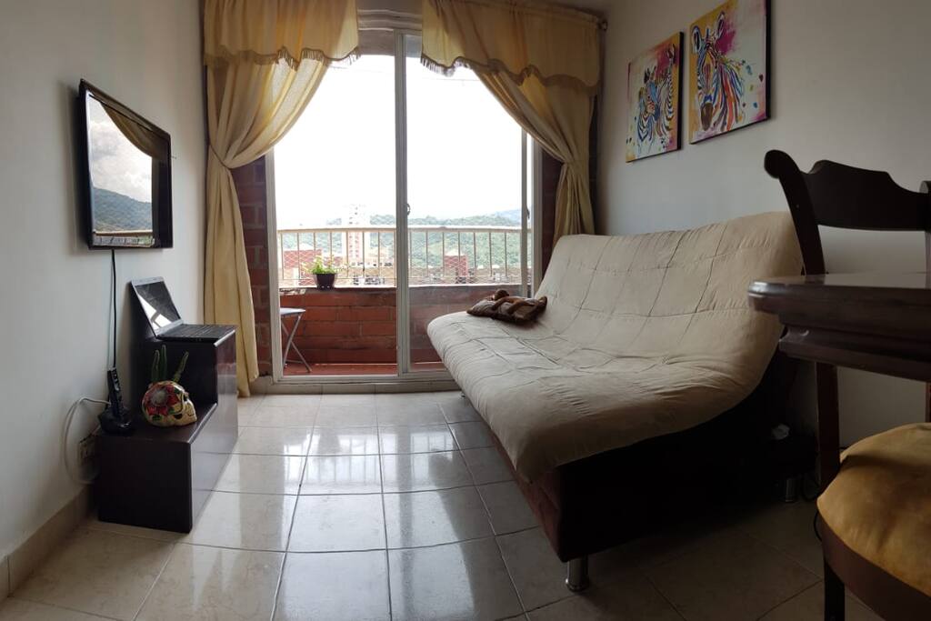 Living room with dining table.