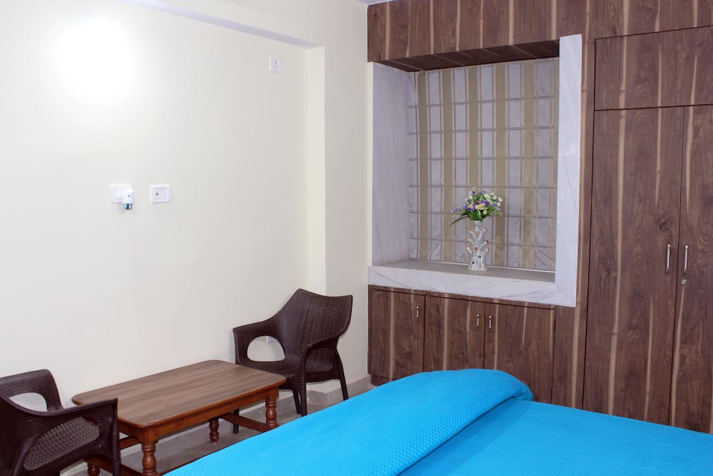 Room has King Size Bed with Comfortable Mattress, Bedsheet, Comforter & Pillows alongwith Dressing cum Work Table, Chairs, Centre Table & Side Tables, Wardrobes and others.