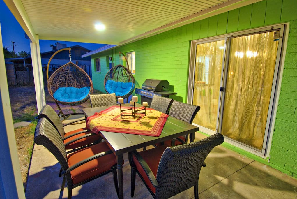 Outside patio with nice table for six guest ad two swig chairs
Also a BBQ grill