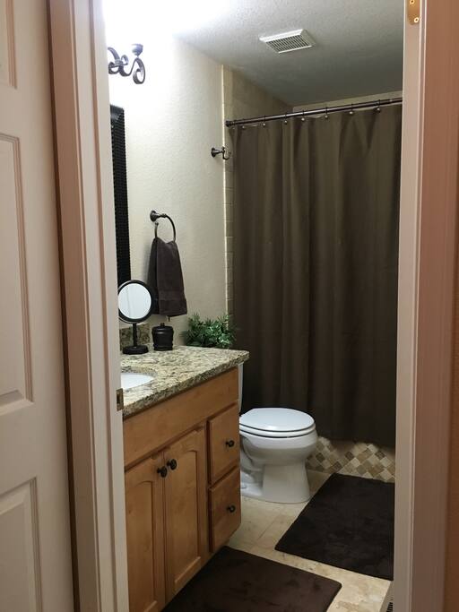 Here's a closer look at your private bathroom. You can leave your shampoo, conditioner and soap at home! There’s a hair dryer in the drawer.