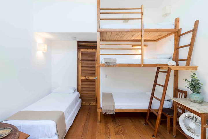 Bedroom #3 .
Room for 4 guests 
It has 3 beds in easy uphill cabin and a separate one-and-a-half square bed. 
Glass pumps floor to ceiling with key and nets that open and close
Has built-in bathroom 

