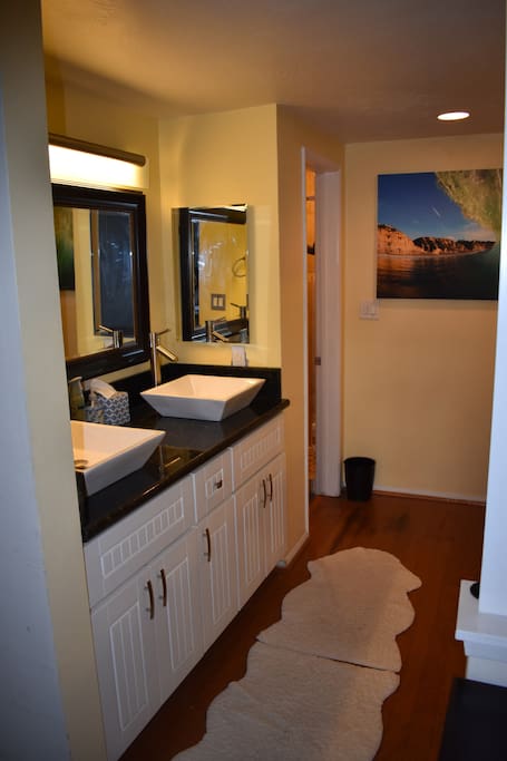Bathroom has double sinks.