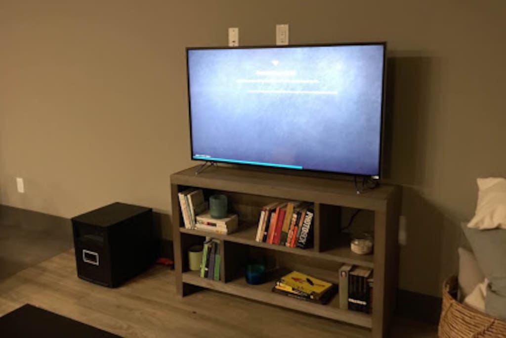 New 50" Vizio smart tv. Features preset Netflix and Amazon Prime. Also pictured is a industrial space heater so guests are able to control the temperature to their preference. The space heater allows you to customize what degree you'd like the space to stay at.