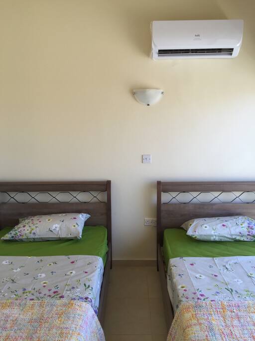 Twin room - with air conditioning and fitted wardrobes