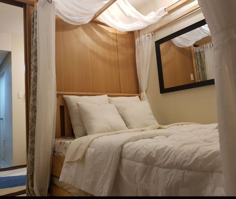 The bedroom cradles one queen-size bed good for 2 adults