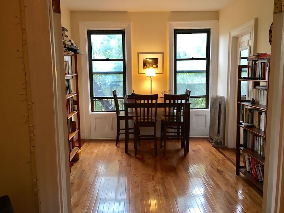 Front dining room, separated by French doors. Street facing.