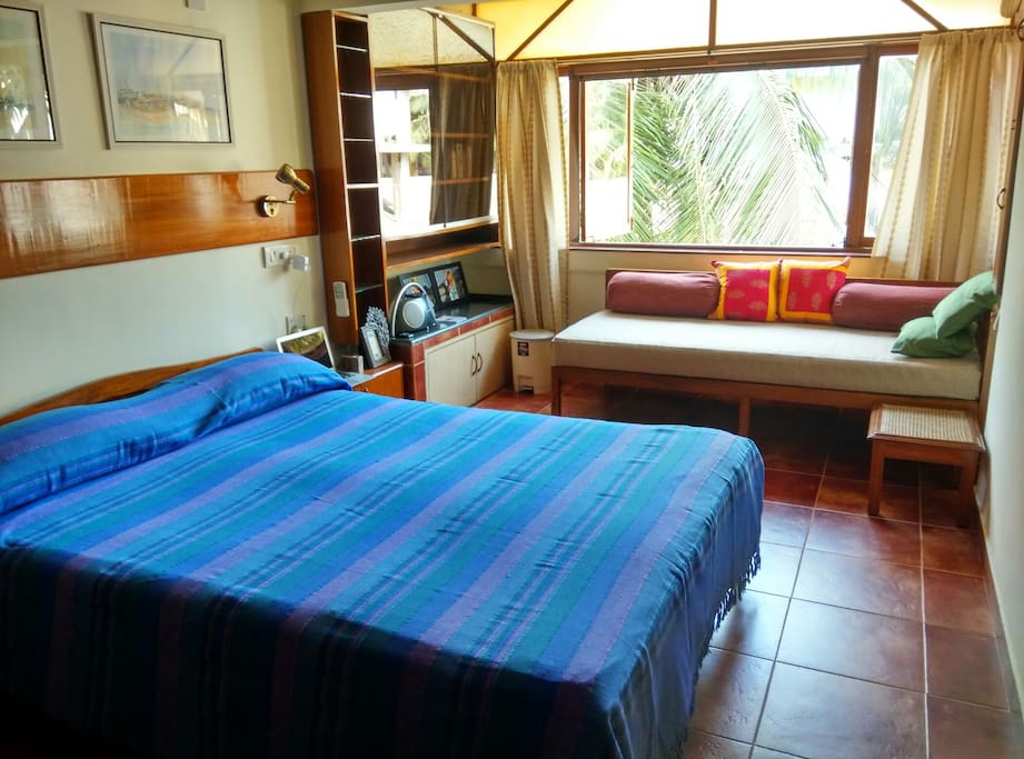Spacious bedroom with an extra bed