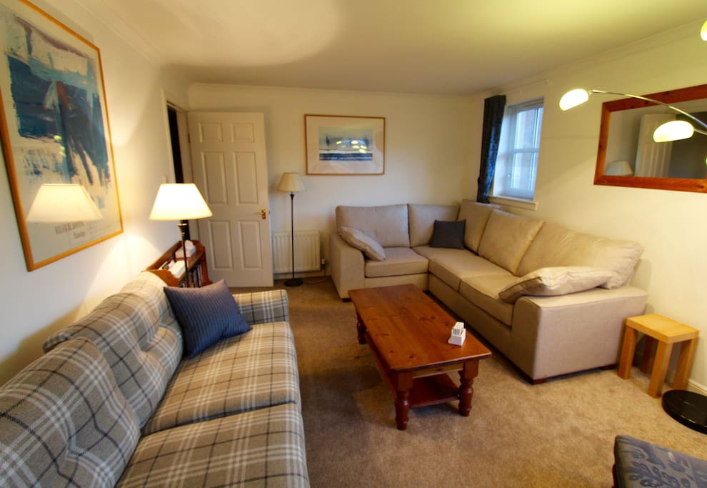 comfy living room with seating for 7 or more