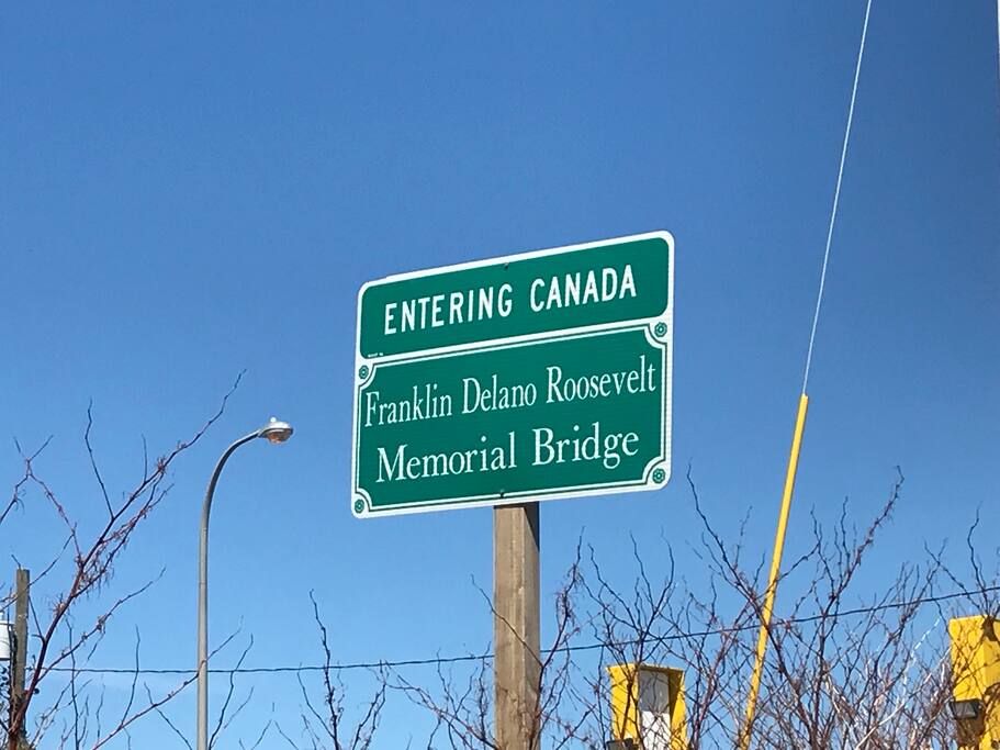 Sign behind the house!