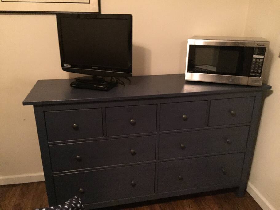 A TV to play some DVDs and a microwave to pop some corn or warm up that doggy bag from the restaurant