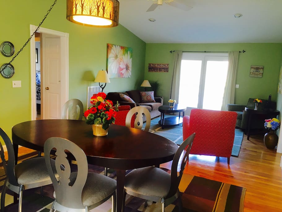 A picture when you first walk in front door - dining table & living room area
