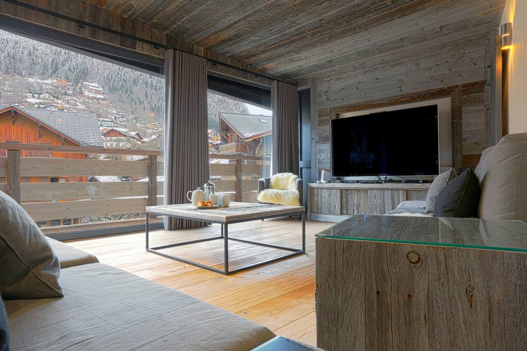 • Floor to ceiling windows open on to wrap around balcony •