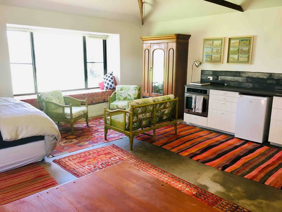 A quirky mix of furnishings makes this space a home away from home